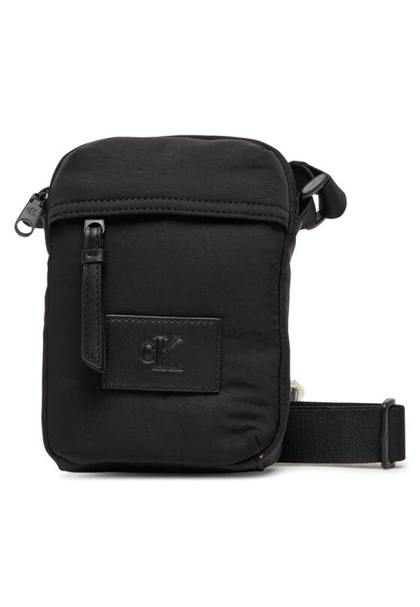 Calvin Klein Jeans Saszetka Metro Nylon Reporter Bag LV04G3089G Czarny. Kolor: czarny. Materiał: materiał