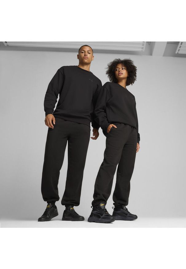 Puma - Spodnie dresowe unisex Essentials Elevated PUMA Black. Kolor: czarny. Materiał: dresówka. Sport: turystyka piesza
