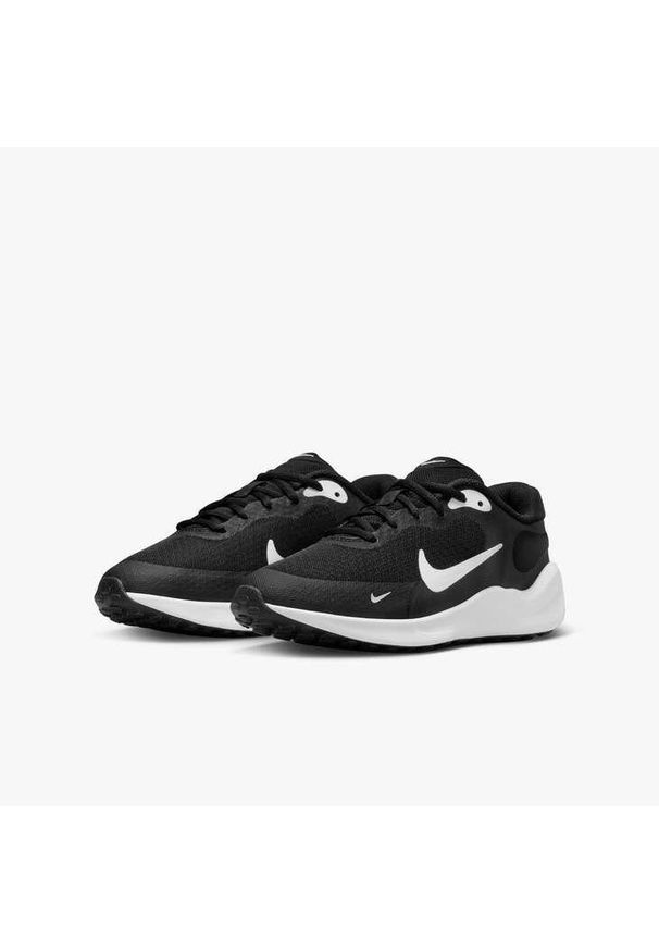 Buty do biegania dla dzieci Nike Revolution 7. Zapięcie: sznurówki. Kolor: biały, wielokolorowy, czarny. Materiał: materiał, syntetyk, tkanina. Szerokość cholewki: normalna. Model: Nike Revolution