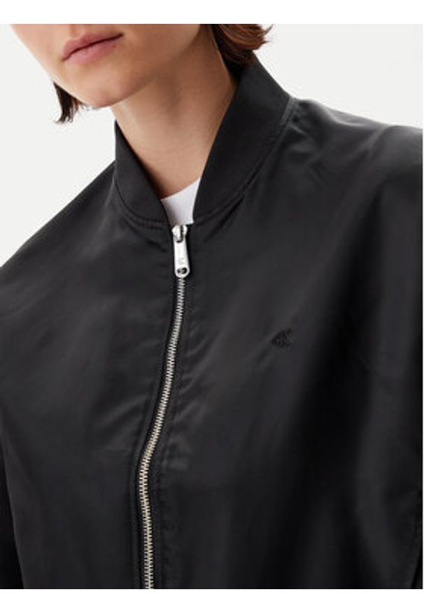 Calvin Klein Jeans Kurtka bomber Hero LV047B528G Czarny Relaxed Fit. Kolor: czarny. Materiał: syntetyk