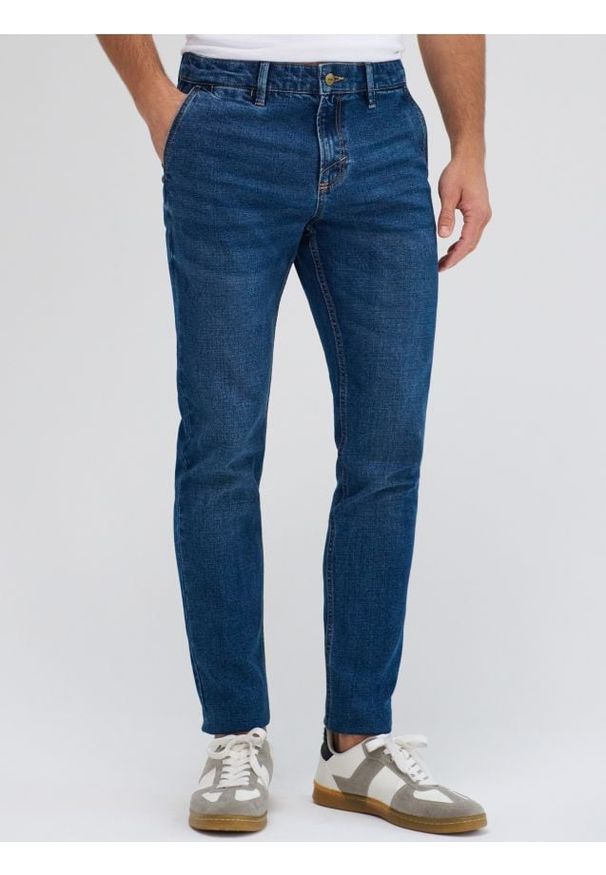 Sinsay - Jeansy chino slim fit - granatowy. Kolor: niebieski. Materiał: jeans