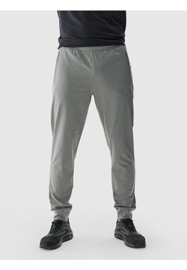4f - 4F Spodnie treningowe szybkoschnące męskie - szare XL. Kolor: szary. Materiał: dzianina, elastan, włókno, syntetyk, materiał. Wzór: jednolity, ze splotem. Sport: fitness