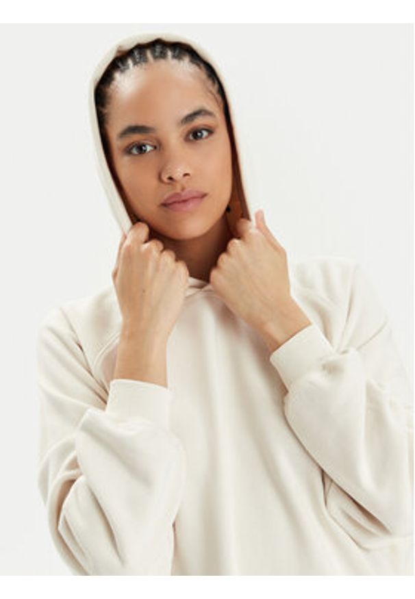 Champion Bluza E10001 Beżowy Relaxed Fit. Kolor: beżowy. Materiał: bawełna