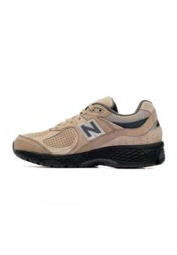 Buty do chodzenia damskie New Balance 2002. Zapięcie: sznurówki. Kolor: beżowy, wielokolorowy. Materiał: skóra, syntetyk, zamsz, materiał. Szerokość cholewki: normalna. Sport: turystyka piesza