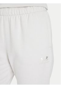 Under Armour Spodnie dresowe Ua Icon 6003676 Écru Loose Fit. Materiał: bawełna