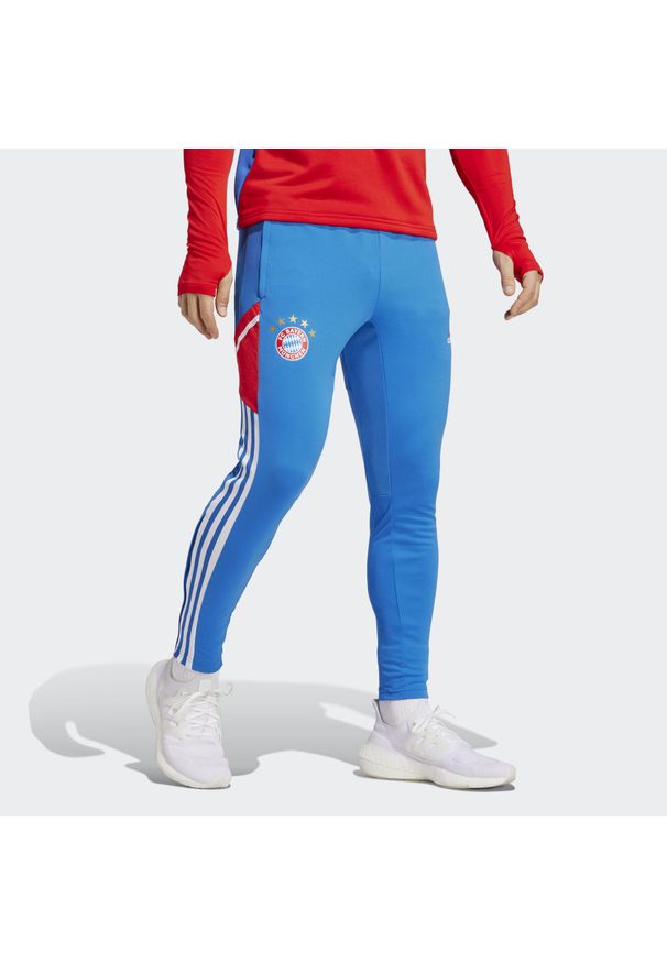 Spodnie piłkarskie męskie Adidas Bayern Munich Condivo 2022/23. Kolor: niebieski. Sport: piłka nożna