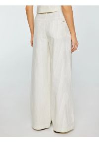 Big-Star - Spodnie damskie lniane z szeroką nogawką w prążek kremowe Kinnisi 102. Stan: podwyższony. Kolor: kremowy. Materiał: len. Wzór: prążki. Styl: wizytowy #3