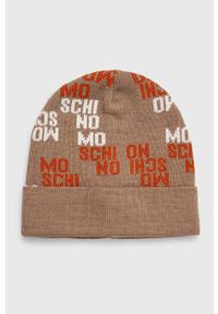 MOSCHINO - Moschino czapka wełniana kolor beżowy wełniana. Kolor: beżowy. Materiał: wełna
