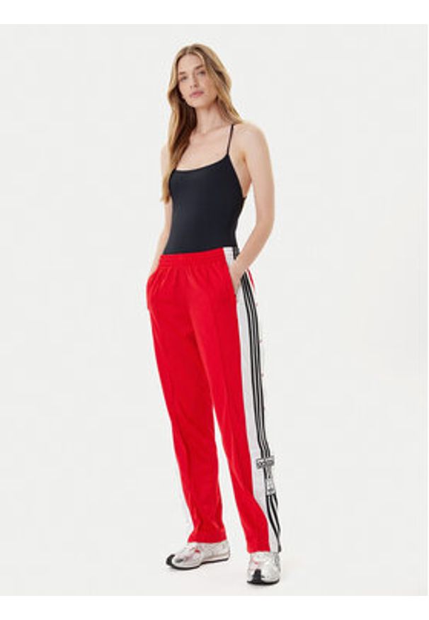 Adidas - adidas Spodnie dresowe Adibreak JY1354 Czerwony Loose Fit. Kolor: czerwony. Materiał: syntetyk