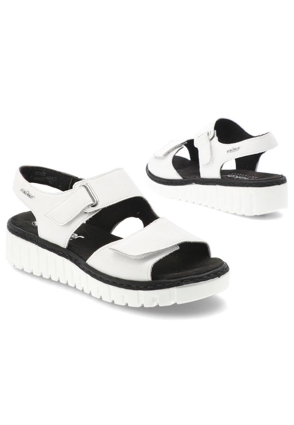 Sandały damskie Rieker, cholewka ze skóry naturalnej z materiałowym wnętrzem zapinane na rzep, białe, V1382-80. Zapięcie: rzepy. Kolor: biały. Materiał: skóra, materiał