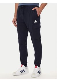 Adidas - adidas Spodnie dresowe Essentials HL2232 Granatowy Regular Fit. Kolor: niebieski. Materiał: bawełna