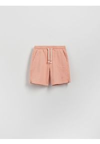 Reserved - Bawełniane szorty - brzoskwiniowy. Kolor: pomarańczowy. Materiał: bawełna