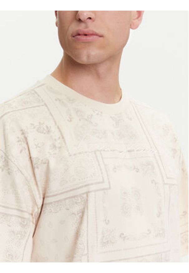 Karl Kani T-Shirt Small Signature Paisley PD00005342 Beżowy Relaxed Fit. Kolor: beżowy. Materiał: bawełna. Wzór: paisley