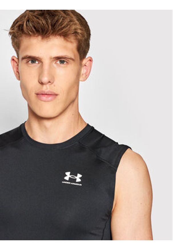 Under Armour Koszulka techniczna HeatGear® 1361522 Czarny Slim Fit. Kolor: czarny. Materiał: syntetyk