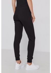 Armani Exchange Spodnie damskie kolor czarny gładkie. Kolor: czarny. Wzór: gładki