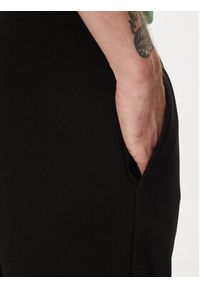 Lacoste Spodnie dresowe XH9624 Czarny Regular Fit. Kolor: czarny. Materiał: bawełna #4