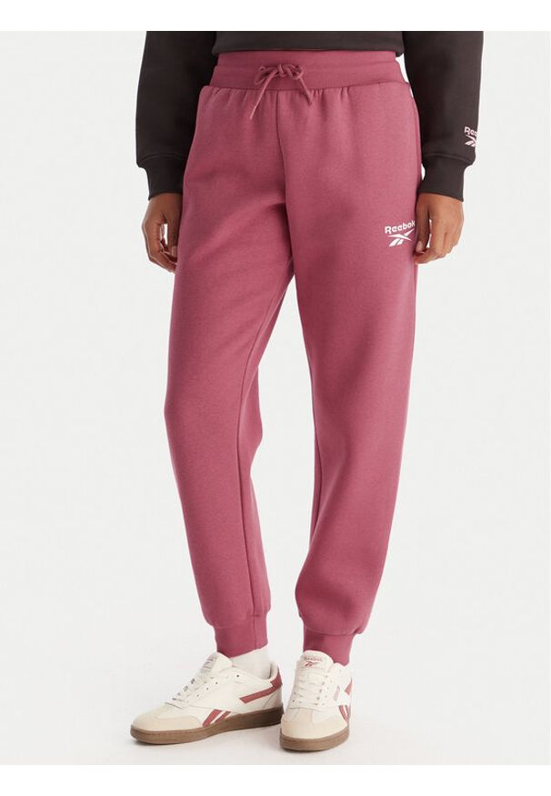 Reebok Spodnie dresowe Erika RK25164CCW Różowy Regular Fit. Kolor: różowy. Materiał: syntetyk