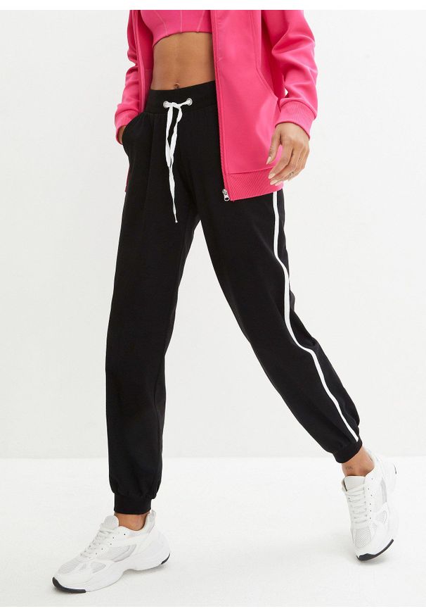 bonprix - Spodnie dresowe z bawełny. Kolor: czarny. Materiał: bawełna, dresówka. Styl: sportowy