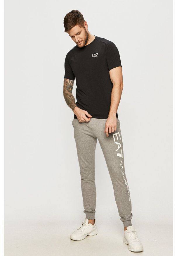 EA7 Emporio Armani - Spodnie. Kolor: szary. Wzór: nadruk