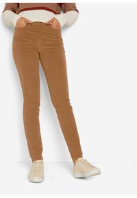 bonprix - Spodnie sztruksowe Skinny ze stretchem. Kolor: brązowy. Materiał: sztruks #1