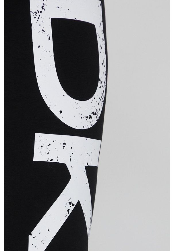 DKNY - Dkny legginsy damskie kolor czarny z nadrukiem. Kolor: czarny. Materiał: dzianina. Wzór: nadruk
