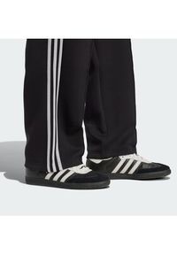 Adidas - adidas Spodnie dresowe adicolor Spacer Track JX1506 Czarny Baggy Fit. Kolor: czarny. Materiał: bawełna. Sport: turystyka piesza #2