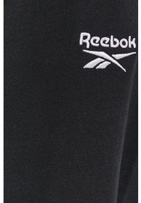 Reebok Classic Spodnie damskie kolor czarny gładkie. Kolor: czarny. Materiał: dzianina. Wzór: gładki