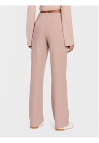 Calvin Klein Jeans Spodnie materiałowe J20J220270 Beżowy Relaxed Fit. Kolor: beżowy. Materiał: materiał, syntetyk