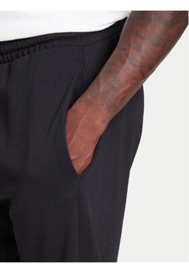 Adidas - adidas Spodnie dresowe Essentials Big Logo IN6163 Czarny Regular Fit. Kolor: czarny. Materiał: bawełna, syntetyk