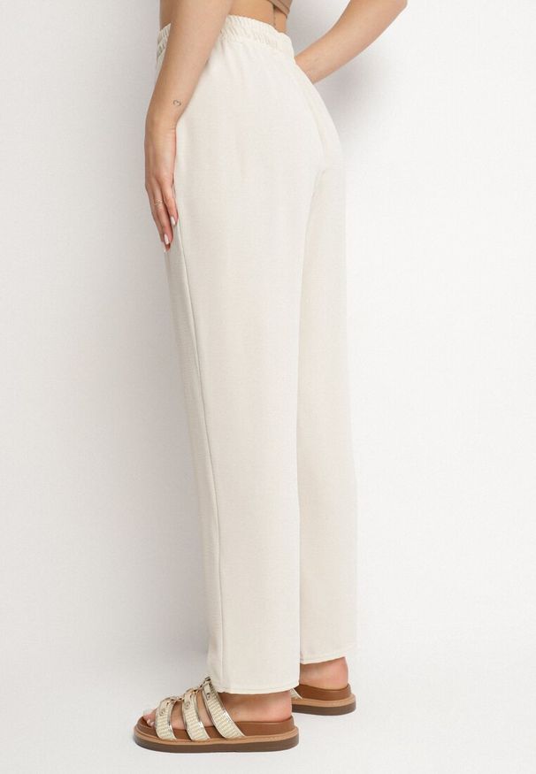 Born2be - Jasnobeżowe Szerokie Spodnie z Bawełną i Wysokim Stanem Neorenna. Okazja: na co dzień. Stan: podwyższony. Kolor: beżowy. Materiał: bawełna. Styl: casual