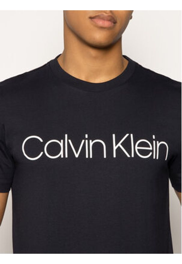Calvin Klein T-Shirt Logo K10K104063 Granatowy Regular Fit. Kolor: niebieski. Materiał: bawełna