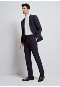Ochnik - Granatowe spodnie garniturowe męskie. Kolor: niebieski. Materiał: bawełna #6