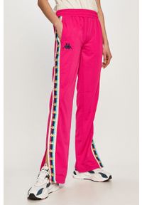 Kappa - Spodnie. Kolor: fioletowy. Materiał: tkanina. Wzór: aplikacja