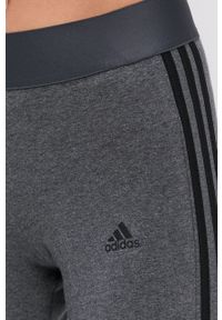 Adidas - adidas Legginsy GV6019 damskie kolor szary gładkie. Kolor: szary. Materiał: dzianina. Wzór: gładki