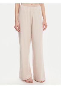 TOMMY HILFIGER - Tommy Hilfiger Spodnie piżamowe UW0UW05776 Beżowy Relaxed Fit. Kolor: beżowy. Materiał: bawełna