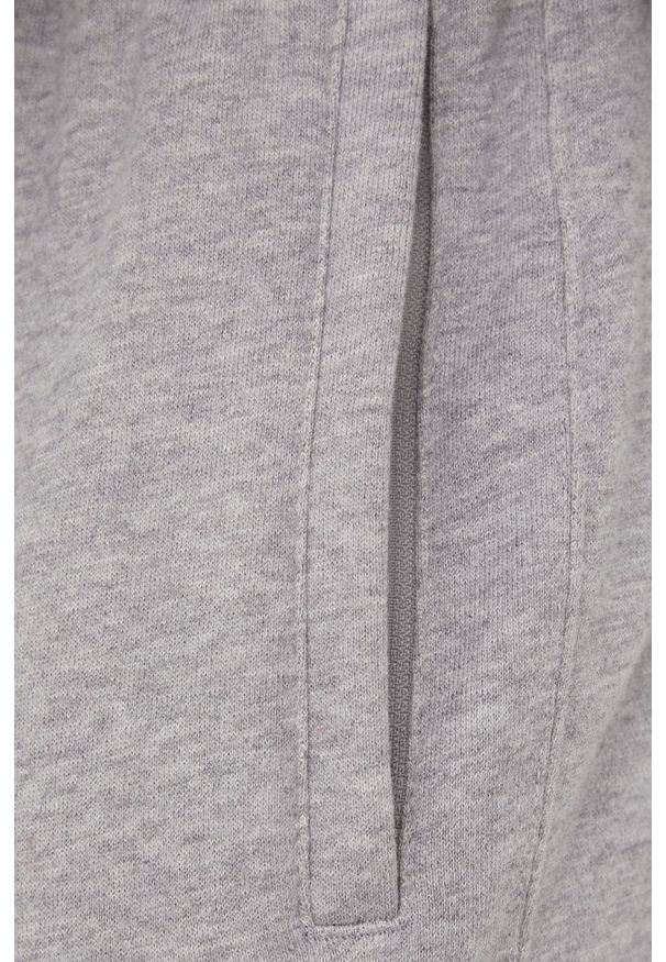 Superdry spodnie dresowe męskie kolor szary gładkie. Kolor: szary. Materiał: dresówka. Wzór: gładki