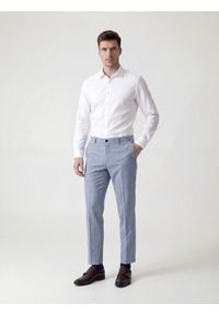 Reserved - Garniturowe spodnie slim fit - jasnoniebieski. Kolor: niebieski. Materiał: wiskoza, tkanina #1