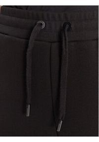 AMI PARIS Spodnie dresowe UTR237.749 Czarny Relaxed Fit. Kolor: czarny. Materiał: bawełna #3