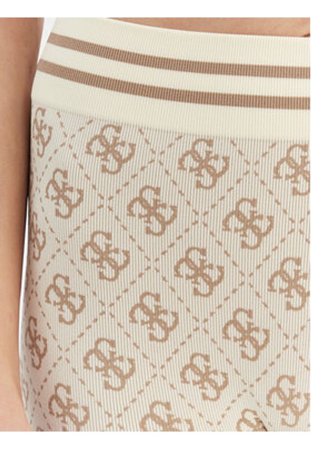Guess Spodnie materiałowe 179838 Beżowy Slim Fit. Kolor: beżowy. Materiał: syntetyk