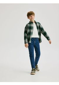 Reserved - Jeansy slim - granatowy. Kolor: niebieski #1