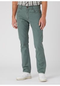 Wrangler - WRANGLER GREENSBORO MĘSKIE SPODNIE MATERIAŁOWE THYME W15QDRG37 112334234. Materiał: materiał