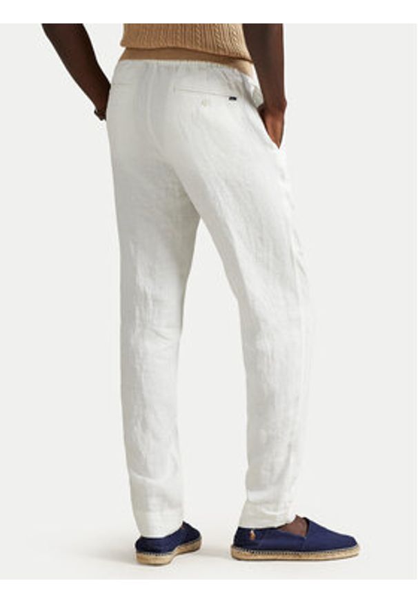 Polo Ralph Lauren Spodnie materiałowe 710940611008 Biały Tapered Fit. Kolor: biały. Materiał: len