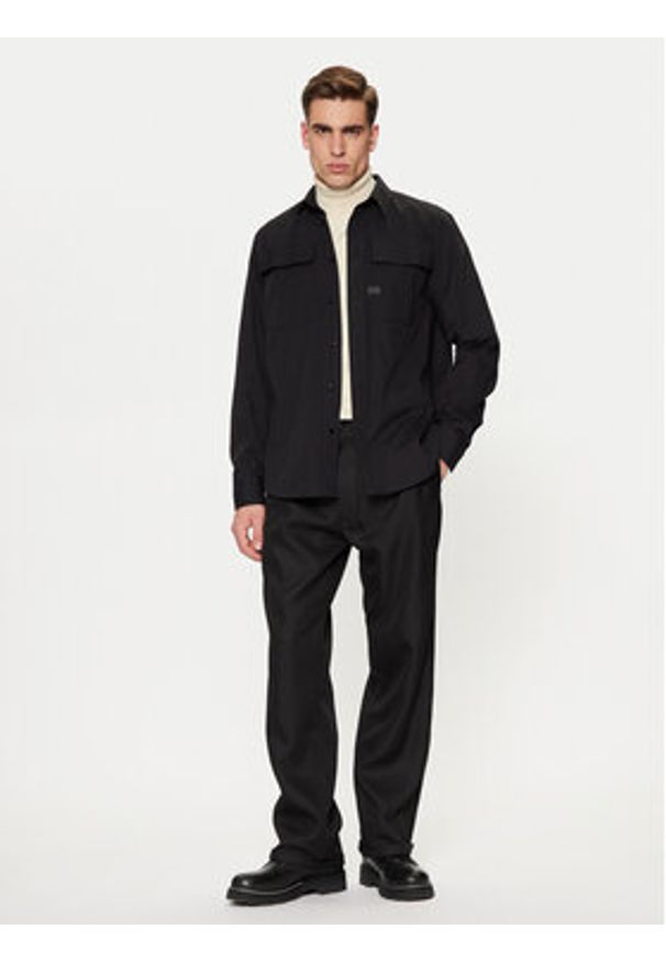 G-Star RAW - G-Star Raw Spodnie materiałowe D25236 6484 Czarny Loose Fit. Kolor: czarny. Materiał: syntetyk