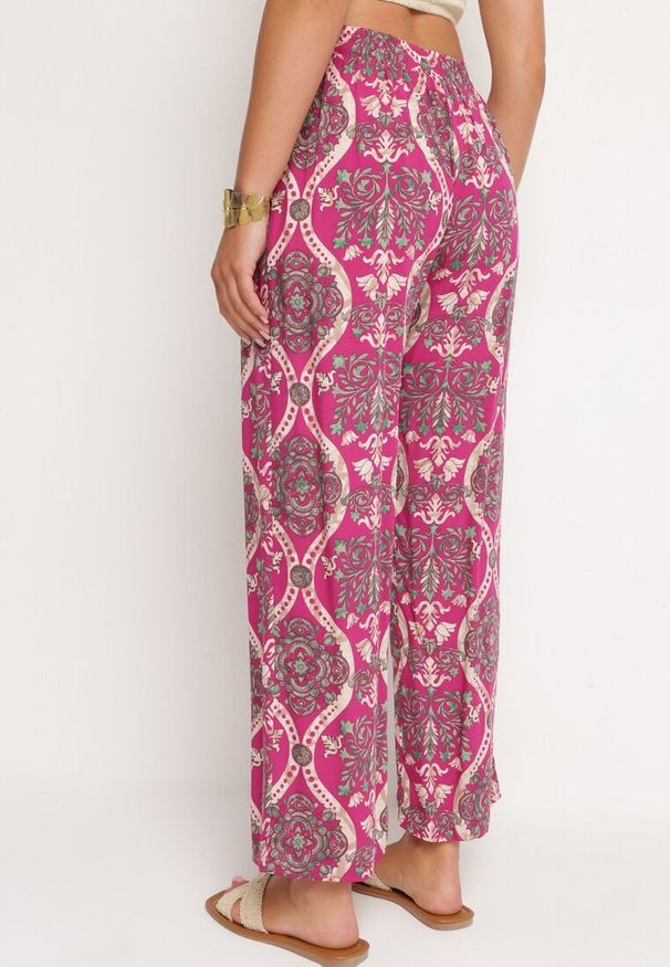 Born2be - Fuksjowe Szerokie Spodnie z Wiskozy w Stylu Boho z Gumką w Pasie i Wysokim Stanem Tiamaylee. Okazja: na spacer, na co dzień, na plażę. Stan: podwyższony. Kolor: różowy. Materiał: wiskoza. Sezon: lato. Styl: boho