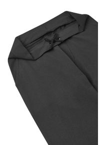 Reima spodnie dziecięce kolor czarny z nadrukiem. Kolor: czarny. Wzór: nadruk