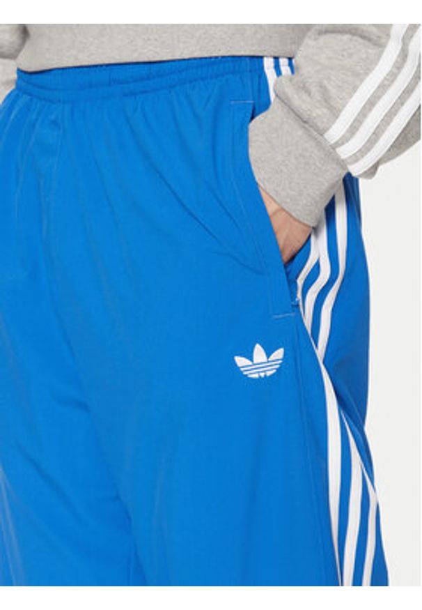 Adidas - adidas Spodnie dresowe adicolor Teamgeist JP1120 Niebieski Regular Fit. Kolor: niebieski. Materiał: syntetyk