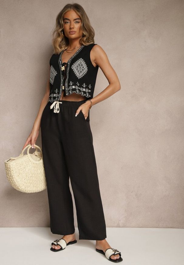Renee - Czarne Spodnie High Waist z Szeroką Nogawką i Gumką w Pasie Mirarena. Okazja: na co dzień, na spotkanie biznesowe, do pracy. Stan: podwyższony. Kolor: czarny. Styl: biznesowy, elegancki, casual