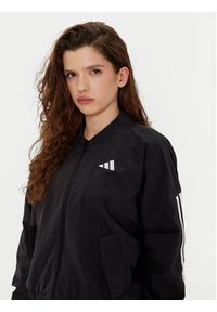 Adidas - adidas Kurtka bomber Essentials 3-Stripes JD5317 Czarny Loose Fit. Kolor: czarny. Materiał: syntetyk