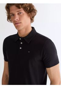 Wrangler - MĘSKA KOSZULKA WRANGLER POLO SHIRT BLACK 112378482. Typ kołnierza: polo #4
