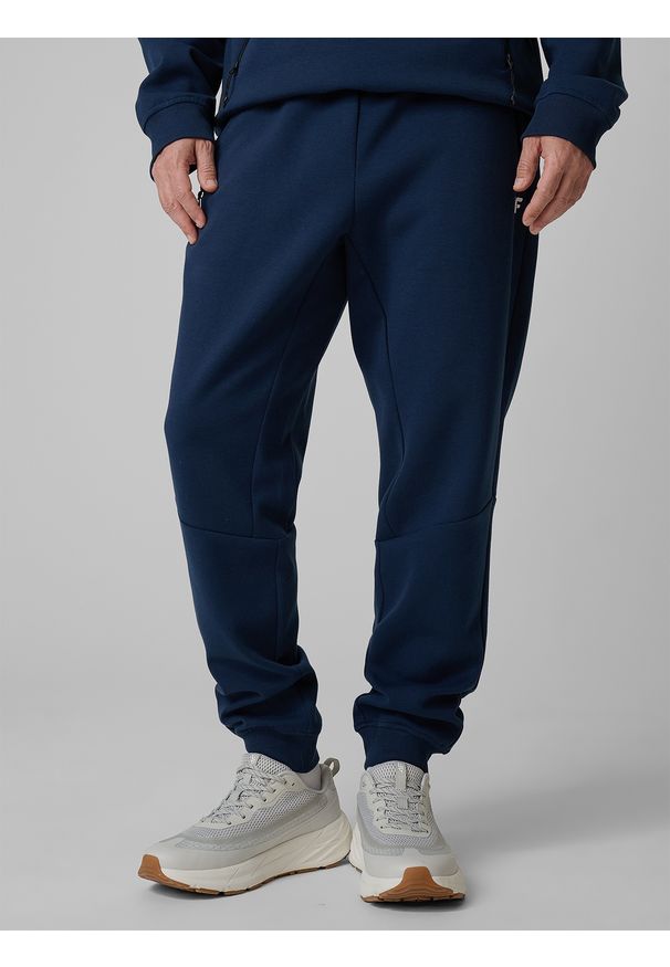 4f - 4F Spodnie dresowe joggery męskie - granatowe M. Kolor: niebieski. Materiał: dresówka